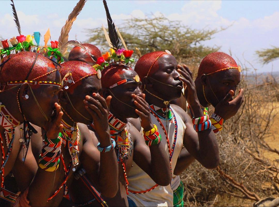 With Maasai warriors in Kenya